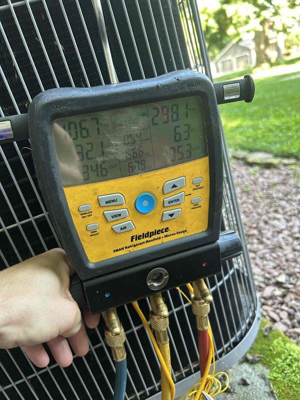 Responded to complaint of AC not cooling adequately. Upon arrival, connected Fieldpiece SMAN digital manifold gauges to outdoor condenser unit and performed complete refrigerant system diagnostics. Measured and recorded superheat, subcooling, and system pressures to evaluate refrigerant charge and overall system performance. System operational at time of inspection with reduced cooling capacity confirmed through temperature and pressure analysis.