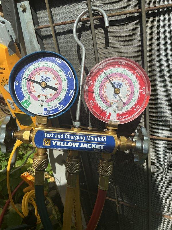 Completed comprehensive tune-up on HVAC system including pressure and temperature diagnostics using manifold gauge set to verify proper refrigerant charge and system operation. Inspected internal components, electrical connections, and wiring harness; cleaned condensate pan and verified all safety controls functioning properly.