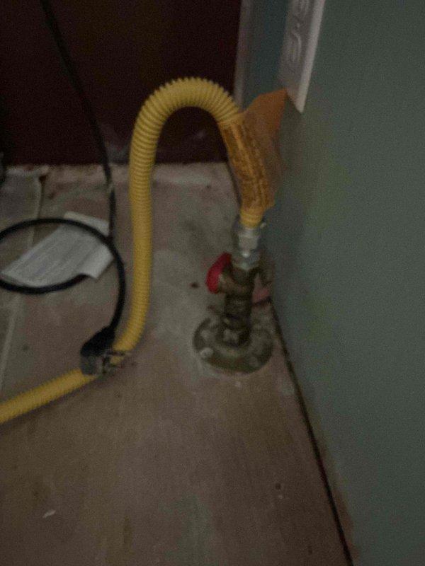 Responded to service call to cap off gas supply line for stove removal. Successfully disconnected yellow flexible gas connector from floor-mounted shutoff valve with brass fittings and properly capped the gas line to ensure safe isolation of the appliance connection point. Verified all connections were secure and leak-free upon completion.