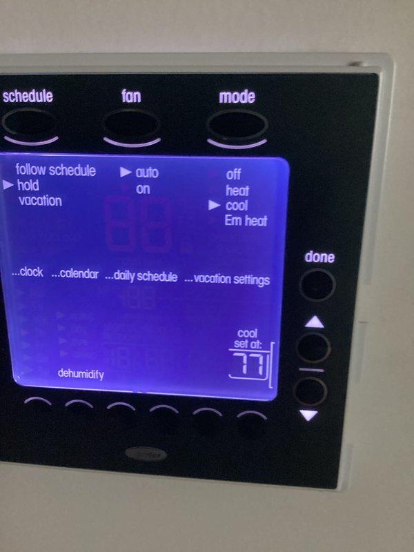 Replaced defective thermostatic expansion valve (TXV) on downstairs air conditioning unit. Verified proper system operation with temperature readings at 71.5°F and confirmed thermostat programming and cooling setpoint functionality upon completion.