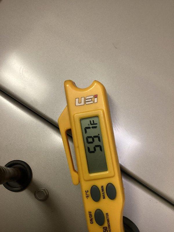 Replaced defective thermostatic expansion valve (TXV) on downstairs air conditioning unit. Verified proper system operation with temperature readings at 71.5°F and confirmed thermostat programming and cooling setpoint functionality upon completion.