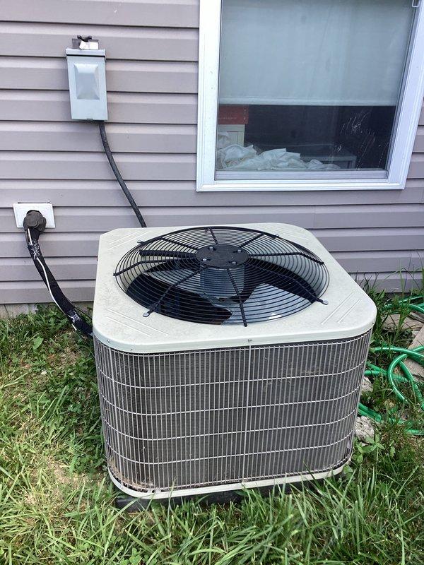 Responded to no cooling call where air conditioning system was making noise but not operating. Upon arrival, found Honeywell ProSeries thermostat set to OFF mode with fan running continuously. Verified outdoor condenser unit had power at disconnect but was not engaging. Cycled thermostat to cooling mode and confirmed proper call for cooling, restoring normal system operation and resolving customer concern.