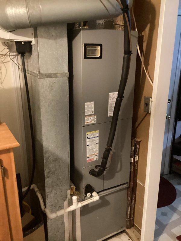 Responded to no cooling complaint on 3-5 year old residential split system. Upon arrival, performed diagnostic evaluation of indoor air handler unit located in basement and outdoor condensing unit. System was completely non-operational with no power to equipment. Identified failed electrical component preventing system startup. Replaced defective part, restored power to system, and verified proper operation of both indoor and outdoor units. Confirmed adequate airflow, proper refrigerant pressures, and normal temperature differential across evaporator coil. System returned to full cooling capacity and left in operational condition.