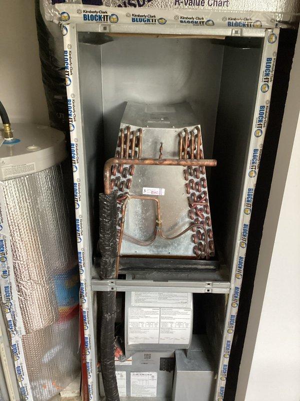 Responded to no cooling complaint after customer self-installed replacement thermostat. Upon arrival, found system blowing hot air with thermostat displaying "Waiting For Equipment" message despite being set to cool mode at 66°F while indoor temperature read 82°F. Diagnosed thermostat wiring issue resulting from improper installation. Verified thermostat configuration, corrected wiring connections to ensure proper communication between thermostat and HVAC equipment. Confirmed evaporator coil and air handler components operational. System restored to normal cooling operation with proper thermostat function established.