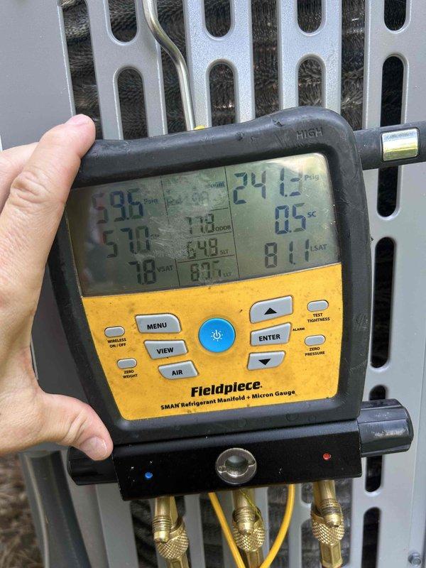 Responded to no cooling complaint on residential air conditioning system. Performed diagnostic evaluation of outdoor condensing unit using digital manifold gauges to measure refrigerant pressures and temperatures. System assessment completed to determine root cause of cooling failure and identify necessary repairs to restore proper operation.