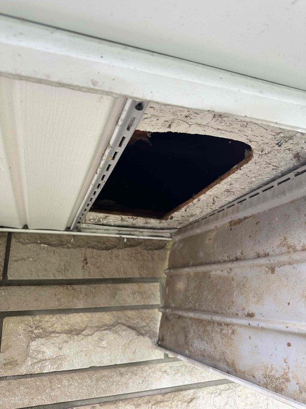 Returned to property to complete permanent repair of condensate drain line that was previously found disconnected above the soffit before entering the downspout. Coordinated with install manager to devise proper repair plan. Successfully reconnected and secured drain line connections using PVC elbows and stainless steel clamp bands to ensure proper drainage flow into downspout system. Documented completed repair with photos showing secured connections in crawl space area beneath deck structure.