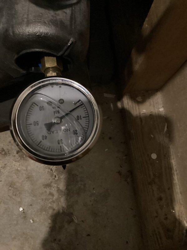 Responded to callback for thermostat connectivity issues and incomplete maintenance. Diagnosed thermostat server connection failure and caution alert display. Verified system humidity levels at 74.8% using digital hygrometer and checked system pressures with gauge readings. Completed remaining maintenance items that were unable to be finished during previous visit due to missing materials. Adjusted thermostat settings closer to customer's preferred temperature of 1 degree differential. System restored to normal operation with proper connectivity established.