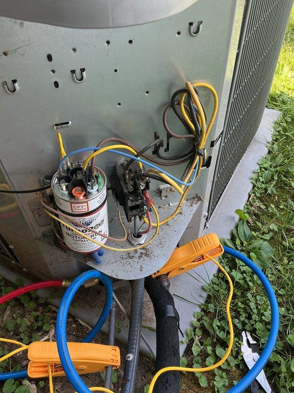 Completed basic monthly cooling maintenance visit on residential air conditioning system. Performed standard inspection of outdoor condensing unit, checking electrical connections at capacitor and contactor, verifying proper wire terminations and component operation. Utilized refrigerant gauges and service hoses to assess system pressures and confirm adequate charge levels. All electrical components functioning within normal parameters, and unit operating as designed with no deficiencies noted. Updated service maintenance record card for customer reference.