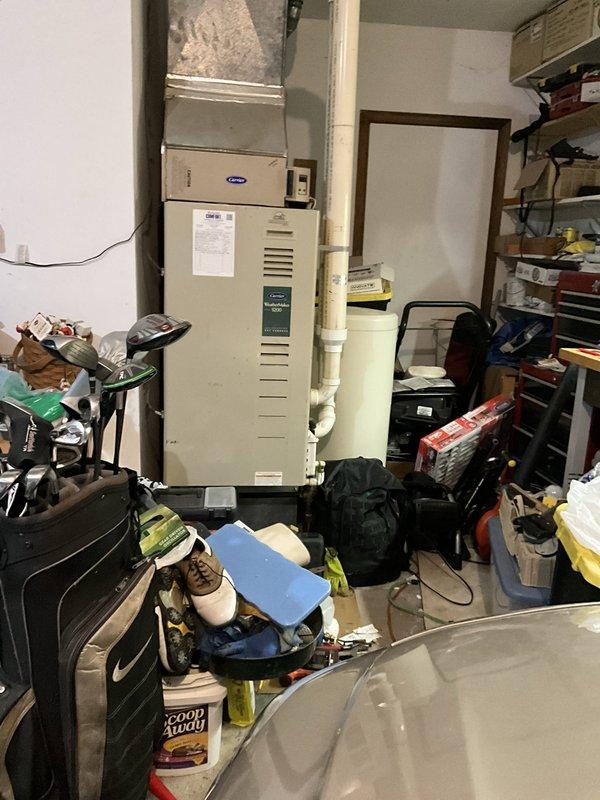 Responded to service call for 1997 HVAC system utilizing R22 refrigerant found to be low on charge. Topped off system with R22 refrigerant to restore cooling operation. Due to age of equipment, phase-out of R22 refrigerant, and condition of existing furnace and air conditioning components, provided estimate for complete system replacement with recommendation to apply repair costs as credit toward new equipment installation.