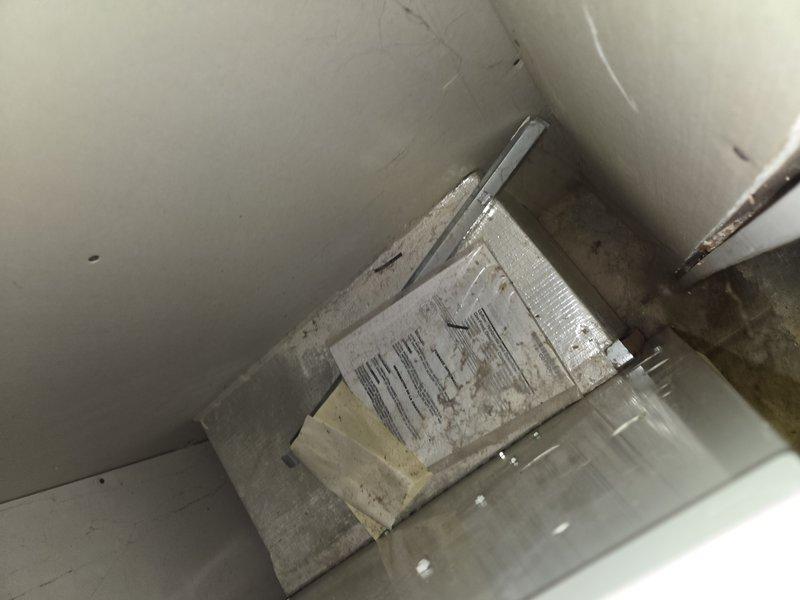 Performed comprehensive evaluation of non-operational residential HVAC system. Existing equipment is approximately 20 years old and has reached end of serviceable life. Documented current system configuration including indoor air handler unit showing significant age-related deterioration and accumulated debris. Assessed existing ductwork and plumbing connections, taking detailed measurements for replacement specifications. Customer currently utilizing temporary window unit for upstairs cooling needs. Provided full system replacement estimate as repair costs approach replacement threshold and equipment age warrants complete system upgrade for reliability and efficiency.