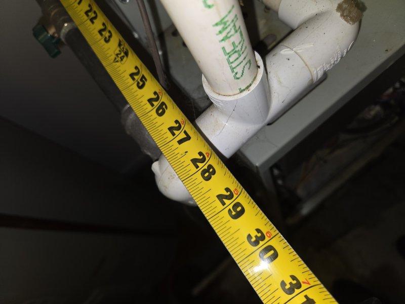 Performed comprehensive evaluation of non-operational residential HVAC system. Existing equipment is approximately 20 years old and has reached end of serviceable life. Documented current system configuration including indoor air handler unit showing significant age-related deterioration and accumulated debris. Assessed existing ductwork and plumbing connections, taking detailed measurements for replacement specifications. Customer currently utilizing temporary window unit for upstairs cooling needs. Provided full system replacement estimate as repair costs approach replacement threshold and equipment age warrants complete system upgrade for reliability and efficiency.
