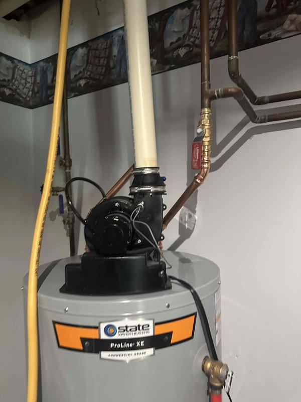 Responded to service call for leaking State ProLine XE commercial-grade tanked water heater at residential property. Performed comprehensive diagnostic inspection of unit, circulation pump assembly, and all associated plumbing connections including copper supply lines, PVC venting, brass fittings, and gas line. Identified source of leak, verified proper combustion operation, and assessed condition of tank, insulation, and mechanical components. Provided customer with repair options and recommendations to resolve the water leak issue.
