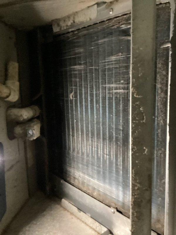 Responded to no cooling complaint on commercial HVAC system. Upon arrival, inspected indoor evaporator coil assembly and outdoor condensing unit. Found system not operating due to failed compressor contactor. Replaced defective contactor, verified proper electrical connections, and tested system operation. Unit restored to normal cooling operation with proper airflow and refrigerant pressures confirmed.