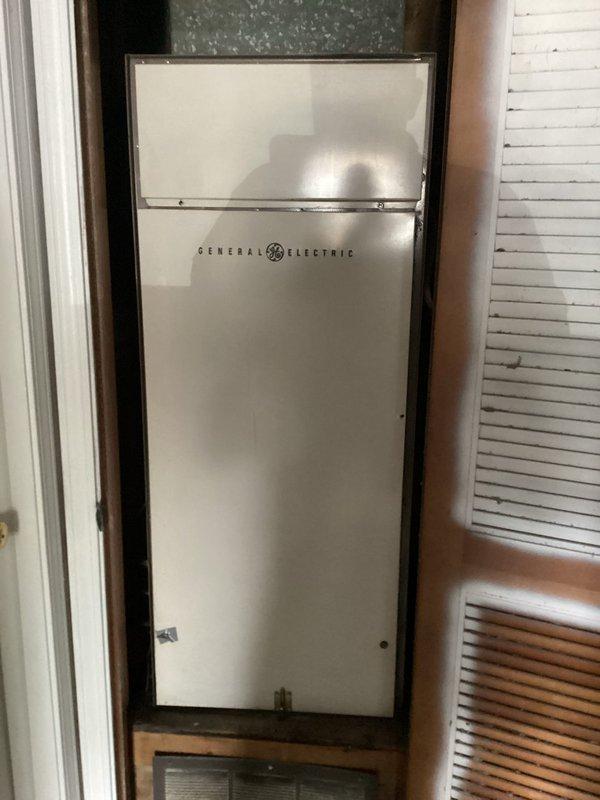 Responded to no cooling complaint on commercial HVAC unit. Upon arrival, found thermostat displaying 84°F and investigated the system. Documented existing conditions with photos of thermostat controls and what appears to be the cooling equipment installation for service records.