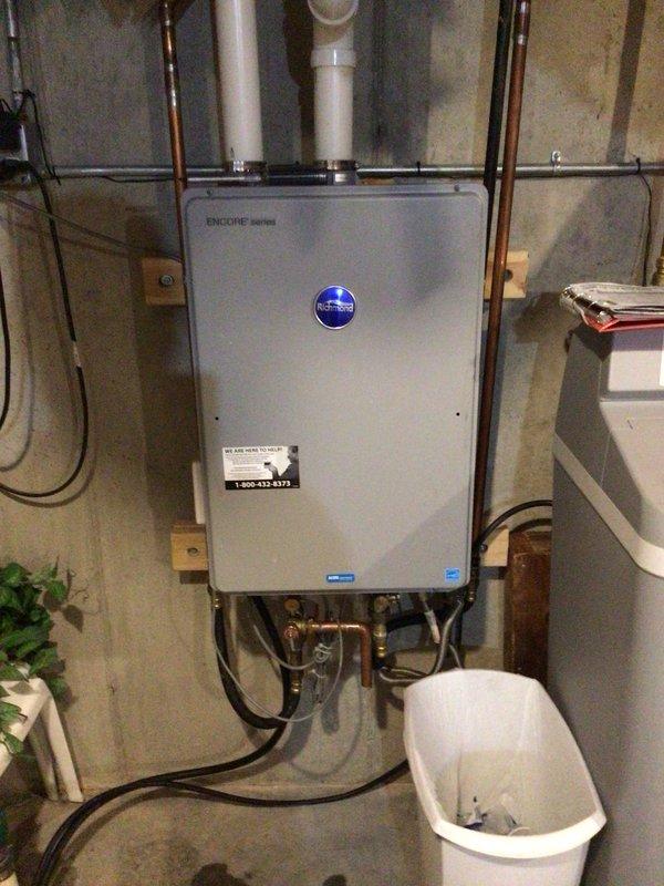 Responded to service call for ENCORE Series tankless water heater displaying persistent descaling error code following recent descaling procedure. Diagnosed faulty flow sensor causing false descaling alert despite proper system maintenance. Replaced defective sensor assembly and verified all electrical connections to control board. Tested unit operation through multiple hot water demand cycles, confirmed proper ignition sequence, verified temperature output at fixtures, and cleared all error codes from system memory. Unit restored to full operational status with proper hot water delivery throughout residence.