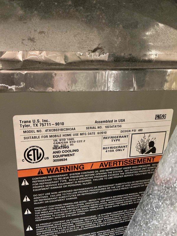 Responded to service call for simultaneous heating and cooling operation on a 2010 Trane mobile home air conditioning unit, model 4TXCB031BC3HCACAA. Performed complete system inspection, cleaned and checked all components to resolve the conflicting operation issue. System restored to proper single-mode operation with appropriate cycling between heating and cooling as needed.