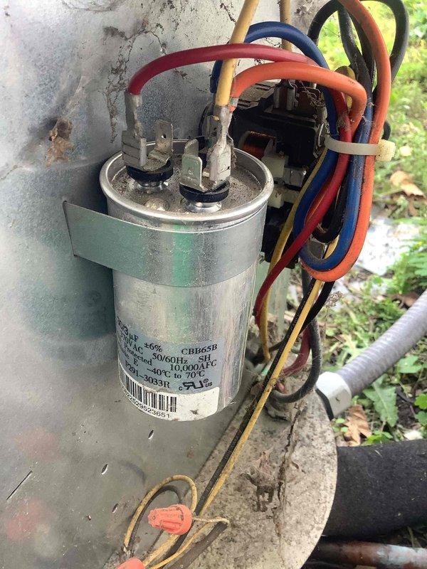Performed routine maintenance cleaning and inspection on residential air conditioning system. Inspected attic-mounted air handler unit and outdoor condenser components including capacitor, contactor, and electrical connections. Verified all wiring connections secure, checked capacitor condition and specifications, and confirmed system operational status upon completion of scheduled maintenance service.