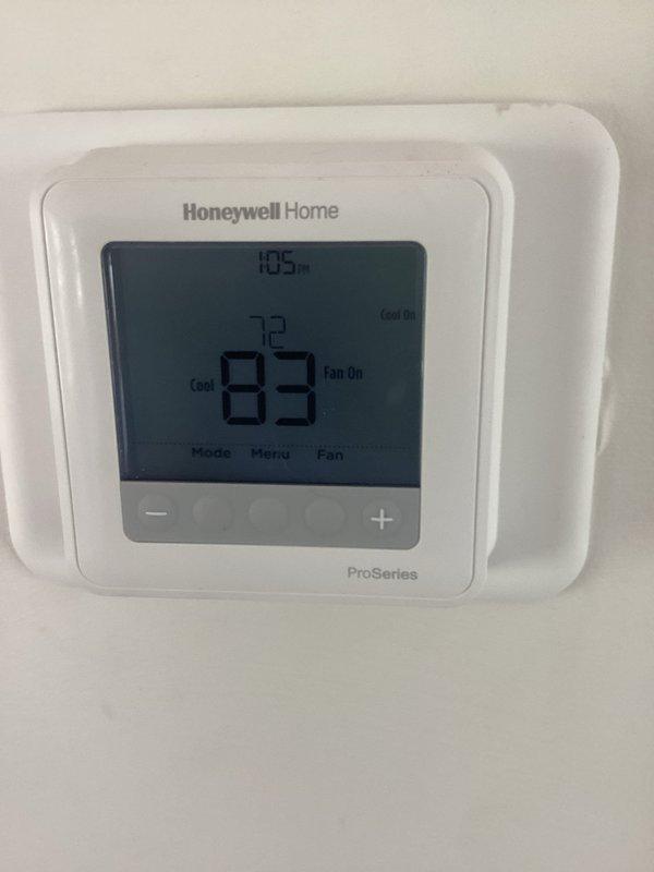 Responded to service call for heat pump system experiencing short cycling and failure to maintain operation after customer installed new Honeywell ProSeries thermostat. Verified thermostat installation, checked wiring configuration at both thermostat and air handler, and tested compressor operation and associated controls to diagnose intermittent shutdown issue.