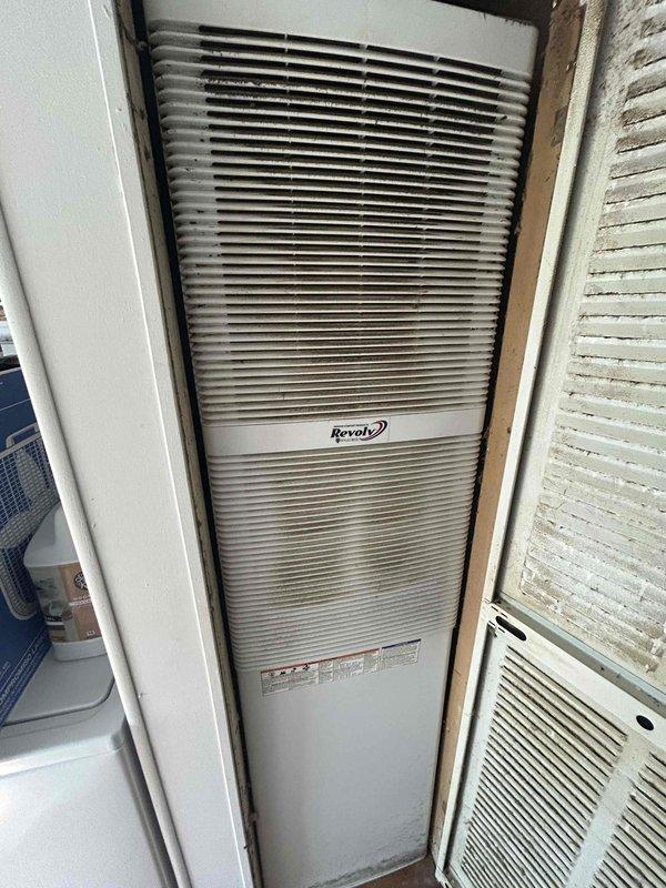 Performed diagnostic evaluation on residential Revolv air conditioning system to assess refrigerant levels and system performance. Inspected indoor air handler unit located in utility closet, examined ductwork connections, and documented equipment condition with visible dust accumulation on components. Customer reported need for refrigerant recharge; full system diagnosis completed to identify potential leak sources and determine appropriate repair recommendations.