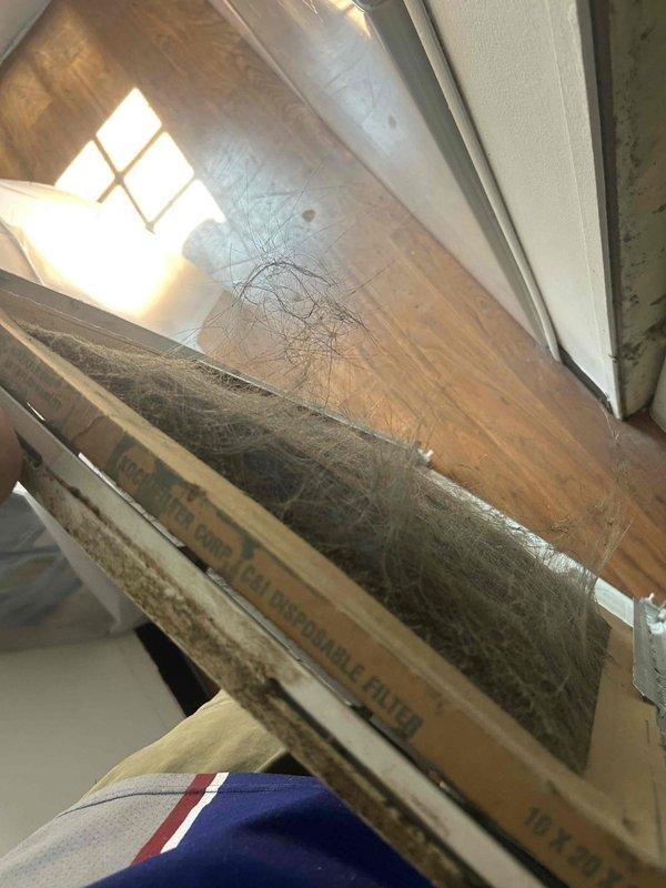 Performed diagnostic evaluation on residential Revolv air conditioning system to assess refrigerant levels and system performance. Inspected indoor air handler unit located in utility closet, examined ductwork connections, and documented equipment condition with visible dust accumulation on components. Customer reported need for refrigerant recharge; full system diagnosis completed to identify potential leak sources and determine appropriate repair recommendations.