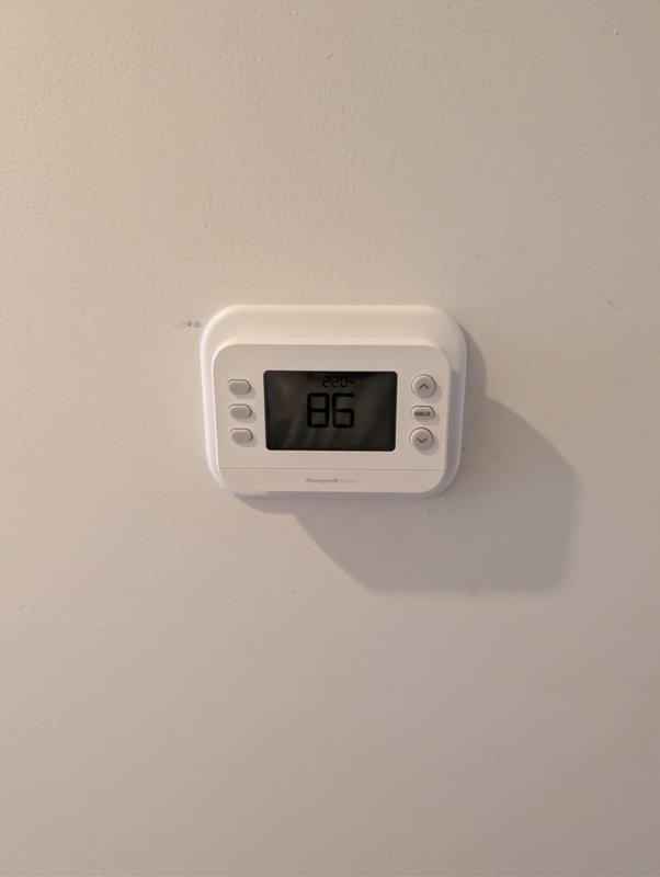 Completed full HVAC system installation consisting of Lennox air conditioning unit and gas furnace. Installed new Honeywell Home digital thermostat with proper wiring and configuration, verified display functionality and cooling mode operation at 86°F setpoint. System utilizes R-454B refrigerant as specified by manufacturer requirements. Verified proper equipment operation, confirmed supply air temperature reading of 69°F at register, and ensured all safety labels and service notices are properly affixed to equipment. Installation financed through service financing program with all required documentation and identification collected and filed.