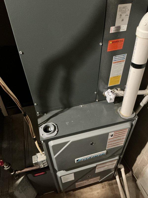 Completed prepaid cooling maintenance tune-up on residential HVAC system with Performance brand furnace and air handler. Performed comprehensive inspection of indoor unit, verified Honeywell ProSeries thermostat operation showing proper cooling mode function with setpoint at 72°F and current temperature at 68°F, inspected refrigerant line connections, condensate drain system, and confirmed all safety labels and equipment specifications were intact and visible. System operating within normal parameters with no issues identified.
