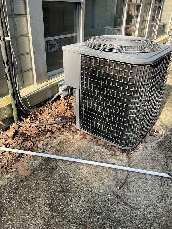 Provided estimate for replacement of non-functioning ceiling-mounted HVAC unit that is currently leaking. Documented existing outdoor condenser unit, refrigerant line set routing along exterior wall, and electrical connections for replacement specifications.