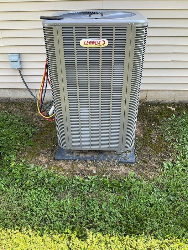 # HVAC Maintenance Report

Completed monthly preventive maintenance service on Lennox outdoor condensing unit as part of Basic Plus cooling maintenance program. Performed comprehensive system inspection including visual examination of condenser cabinet, louvers, and mounting pad condition. 

Accessed electrical compartment and evaluated all internal components. Identified TITAN PRO capacitor model TRCP355 requiring inspection. Examined all electrical connections, terminals, and wiring harnesses for proper connectivity and signs of wear. Verified relay operation and assessed condition of all wire terminations throughout the control circuit.

Inspected fan motor assembly and compressor electrical connections. Checked disconnect box and external wiring for secure mounting and proper condition. Replaced 20x20x4 air filter as included in Basic Plus service agreement.

System operational and functioning within normal parameters upon completion of scheduled maintenance visit.