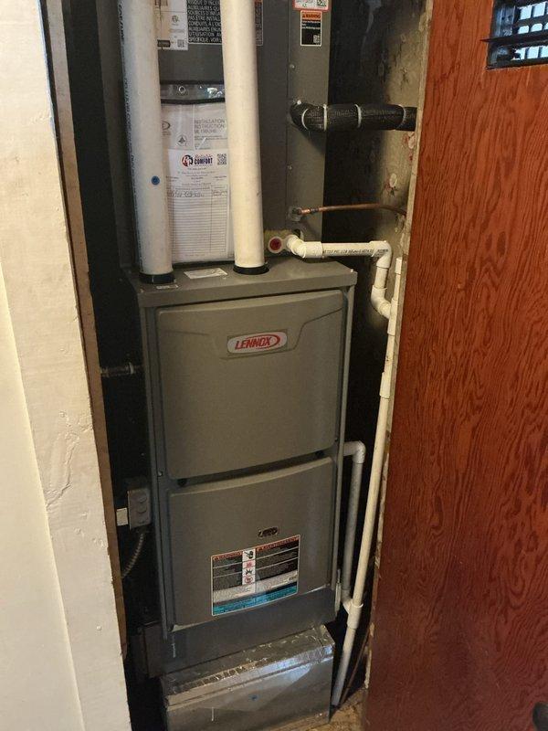 Completed annual cooling maintenance visit on residential Lennox HVAC system. Performed comprehensive inspection of furnace unit, condenser fan motor assembly, and associated components including PVC venting, electrical connections, and refrigerant lines. Installed 20x25x4 air filter as part of routine maintenance. Verified proper operation of condenser fan blades and motor shaft assembly, confirmed all manufacturer labels and safety warnings remain legible, and documented system condition through photographic records. All equipment found operating within normal parameters with no immediate service needs identified.