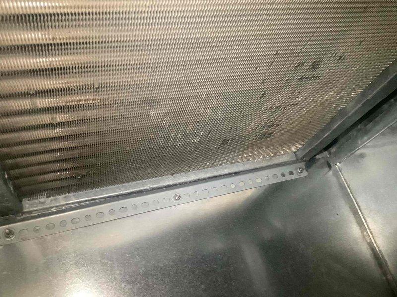 Performed tune-up and inspection on residential air conditioning system. Customer reported intermittent condenser fan motor operation over the past six months with motor "toning down" periodically. Inspected outdoor condenser unit and verified system operational at time of service. Evaluated condenser fan motor performance, checked electrical connections, and assessed evaporator coil condition. System currently functioning, though motor exhibits signs of potential wear requiring monitoring for future replacement.