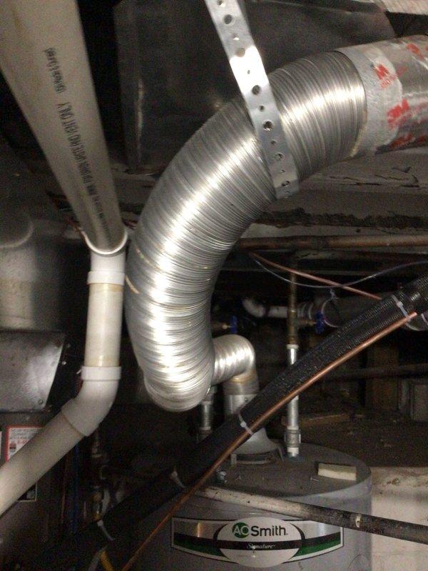 # Plumbing Service - Faucet

Responded to service call for leaking laundry faucet identified during home inspection prior to sale. Provided complimentary second opinion consultation on multiple plumbing and HVAC concerns including flue replacement requirements and faucet repair needs. Upon inspection, evaluated the laundry room faucet assembly and confirmed active leak requiring repair. Documented mechanical room conditions including water heater installation, HVAC ductwork configuration, and associated plumbing connections with photographic evidence for homeowner records. Credit applied toward completed repair work as part of consultation service agreement.
