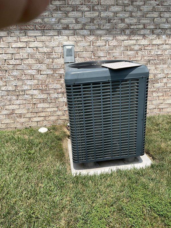 Responded to customer request for HVAC system replacement estimate after complete heat pump and air handler system failure. Assessed existing Guardian brand air handler unit installed in basement utility area with associated outdoor heat pump condenser unit positioned on concrete pad against exterior brick wall. Documented current equipment configuration including refrigerant line connections, electrical service, PVC drainage system, and overall installation condition through comprehensive site photography to provide accurate replacement system specifications and pricing proposal.