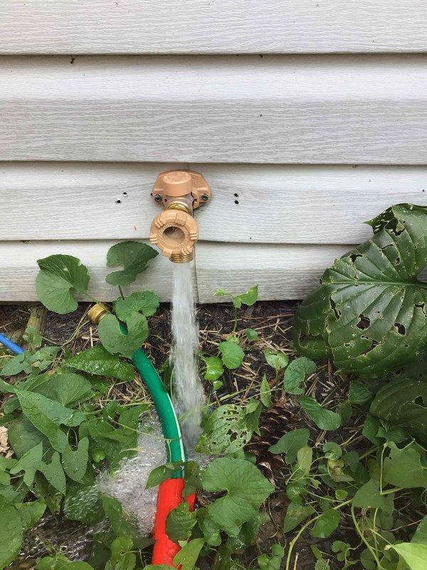 Responded to service call for two exterior hose bibb issues: a leaking spigot at the rear of the property and a front spigot protruding excessively from the siding. Upon inspection, confirmed active water discharge from the back spigot, indicating failed internal washer or valve seat deterioration. The front hose bibb was found improperly secured with inadequate support, causing the fixture to extend beyond acceptable mounting standards. Performed necessary repairs to both fixtures, including replacement of worn internal components on the leaking unit and proper reinstallation and securing of the protruding spigot to ensure flush mounting against the exterior wall. Tested both fixtures under full pressure to verify leak-free operation and proper functionality.