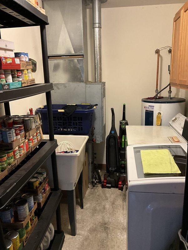 Completed HVAC estimate for air conditioning system addition to existing furnace installation. Assessment included evaluating current furnace setup, determining optimal placement for new AC unit, and identifying electrical routing requirements for proper integration of cooling system with existing heating equipment in basement utility area.