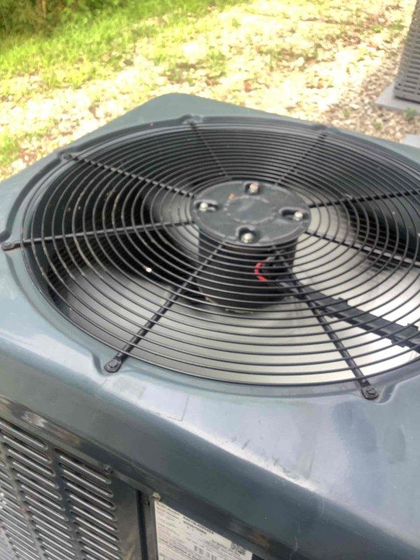 Responded to callback for system blowing hot air and experiencing intermittent operation overnight. Inspected outdoor condenser unit and control panel wiring, finding loose connections at start relay and capacitor terminals. Tightened all electrical connections, verified proper voltage at compressor contactor, and tested system operation through complete cooling cycle. Unit now operating properly with correct temperature differential and no further issues observed.