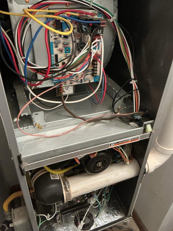 Completed scheduled cooling season maintenance on a 9-year-old air conditioning system. Performed comprehensive tune-up including inspection of internal components, control board, wiring connections, blower motor assembly, and heat exchanger. Verified all electrical connections were secure and properly terminated according to manufacturer specifications. Tested system operation and took temperature readings using diagnostic equipment to ensure proper cooling performance. Inspected condensate drain line and confirmed proper drainage. All components found to be operating within normal parameters with no immediate service needs identified.
