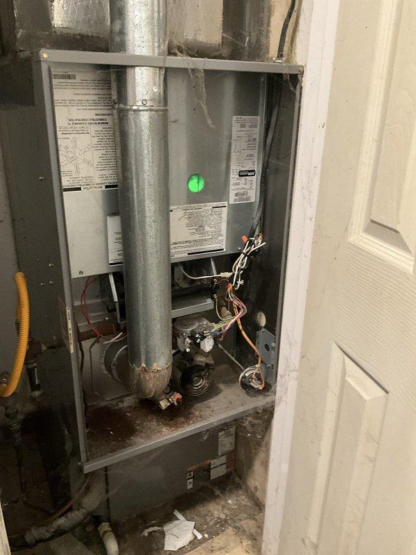 Conducted comprehensive assessment of residential cooling system with failed compressor. Evaluated existing air handler and ductwork installation in mechanical closet, documenting current system configuration and component conditions. Provided detailed replacement estimate for complete AC system upgrade, including specifications for new condensing unit, compatible air handler, and necessary electrical modifications to ensure proper operation and code compliance.