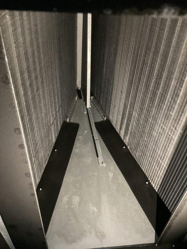 Completed monthly basic cooling maintenance visit on HVAC system. Performed standard inspection of evaporator coil assembly, verified proper operation of control board and capacitor, confirmed all electrical connections secure, and documented system components. Unit operating within normal parameters with no issues identified during service.