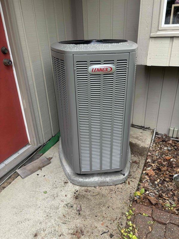 Completed full HVAC system installation consisting of Lennox brand air conditioning condenser unit and gas furnace. Outdoor condenser positioned on concrete pad with refrigerant lines connected and routed to building, indoor air handler installed in utility area with proper electrical connections and ductwork integration. System fully commissioned, tested for proper operation, and left in working condition with all refrigerant lines, condensate drainage, gas connections, and electrical wiring installed per manufacturer specifications.