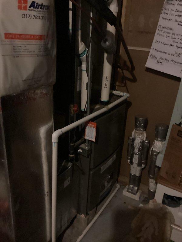 # HVAC Service Call - No Cooling Issue

Responded to no cooling complaint on residential HVAC system over 10 years old. Upon arrival, found Honeywell thermostat calling for cooling with display showing 79°F actual temperature and 68°F setpoint, with system status indicating "Cool On" mode. Inspected dark green air handler unit located in utility closet alongside water heater. Performed diagnostic evaluation of system components including electrical connections, refrigerant levels, and operational controls. Verified proper thermostat operation and communication with air handler. System restored to normal cooling operation and tested for proper cycling and temperature response.