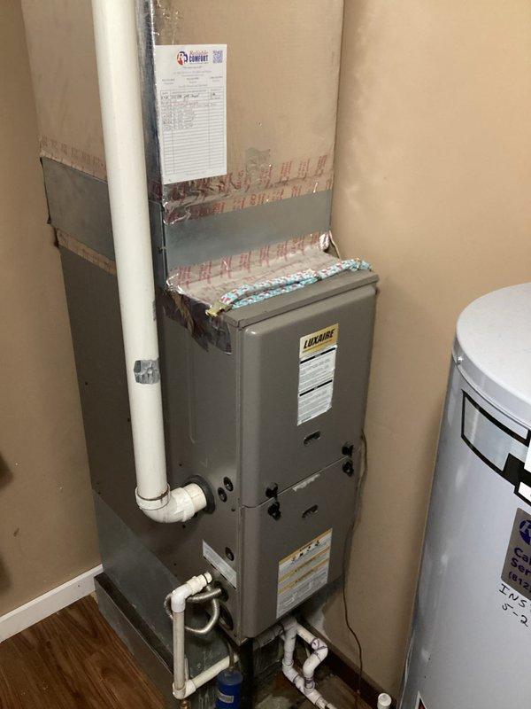 Responded to customer concern regarding insufficient cooling and elevated utility costs. Performed system inspection of Luxaire furnace and cooling system, verified thermostat operation showing 70°F setpoint with system in cooling mode. Inspected ductwork insulation, condensate drain lines, and overall HVAC installation for proper operation and potential efficiency issues.