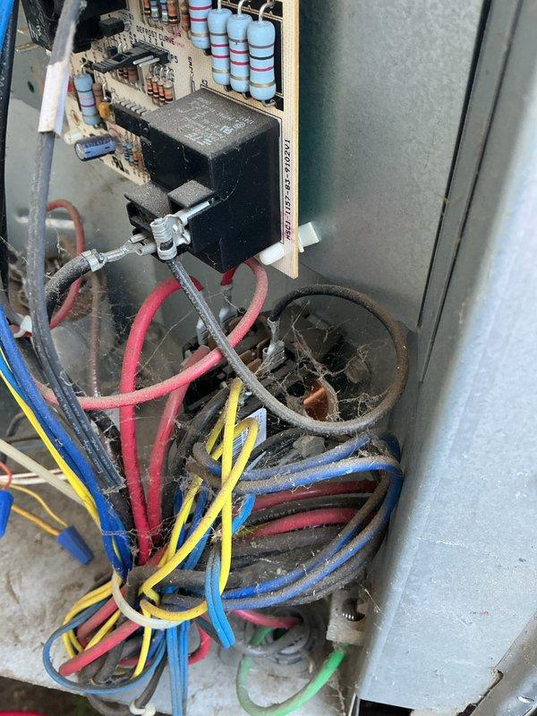 Completed basic monthly cooling maintenance visit on Guardian brand air conditioning system. Performed standard inspection of outdoor condenser unit and electrical components, noting moderate dust accumulation on internal wiring and circuit board. All equipment operational at time of service, with condenser unit showing normal wear consistent with age and outdoor exposure.