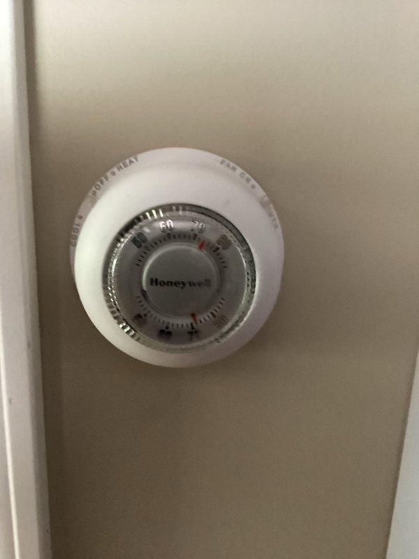 Responded to no-cooling call at vacant property where unit had frozen evaporator coil causing water damage to carpet. Upon arrival, found system thawed and confirmed proper superheat reading of 5.85°F on JB-71 model unit manufactured 05/2025, indicating system was operating within normal parameters. Verified thermostat settings and system functionality, confirmed unit cycling properly between heat and cool modes with no further issues detected.