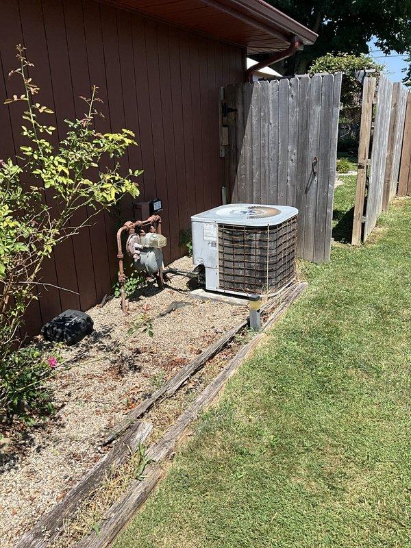 Responded to service call for air conditioning system low on refrigerant. Performed comprehensive evaluation of residential split system including Tempstar indoor air handler and outdoor condensing unit. Conducted visual inspection of both indoor and outdoor components, documented equipment condition through photographs, and assessed system age and overall operational status. Based on findings, provided estimate for complete cooling system replacement to address refrigerant loss and system reliability concerns.