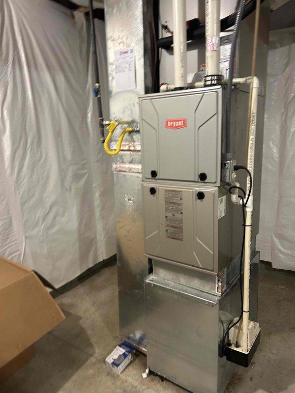 Completed basic monthly cooling maintenance on residential Bryant HVAC system. Inspected indoor furnace unit including gas connections, electrical components, and ductwork; verified proper operation of all safety controls and gas shutoff valves. Performed outdoor condenser unit inspection, noting normal dirt and debris accumulation on coil grille and cabinet; all components operating within manufacturer specifications and system functioning properly.