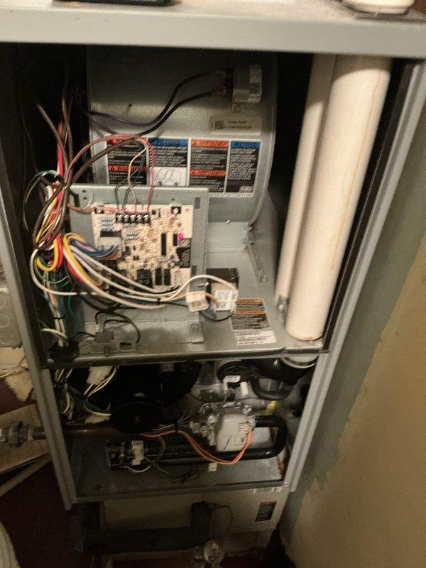 Completed comprehensive cooling season tune-up on residential HVAC system. Performed full system inspection including thermostat functionality verification, electrical component testing at control board, and blower motor assembly examination. All components found operating within manufacturer specifications, thermostat responding properly to temperature adjustments, and system cycling correctly between heating, cooling, and off modes.