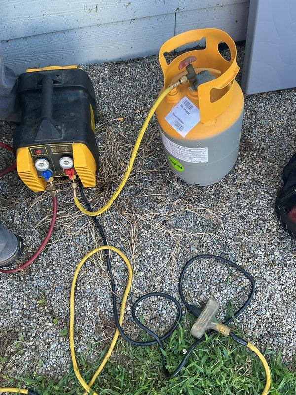 Returned to site to complete previously diagnosed repair on outdoor air conditioning unit. Installed new Schrader cores and valve assemblies on refrigerant service ports. Performed comprehensive leak test to verify system integrity, then properly charged system to manufacturer specifications using recovery equipment. Leveled outdoor condenser unit on pad to ensure proper operation and drainage.