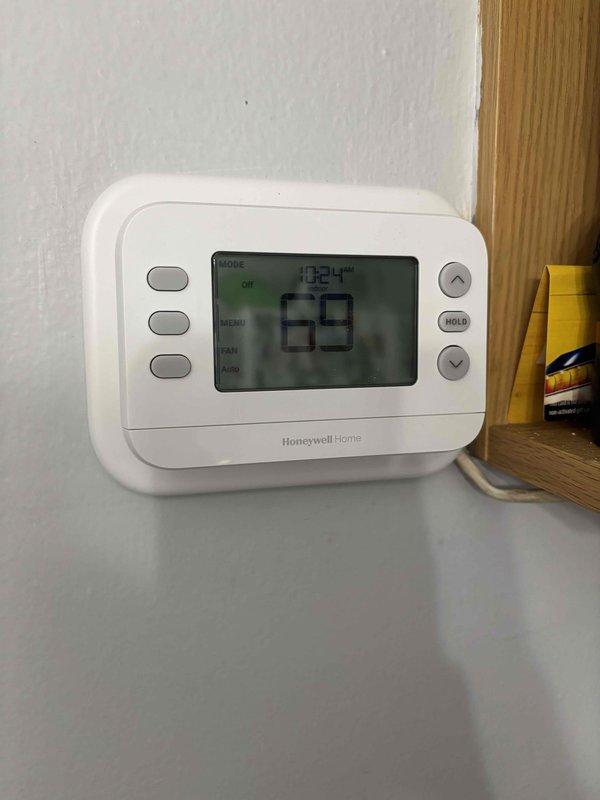 Completed full HVAC system installation at residential property. Installed new heating and cooling equipment, configured Honeywell Home programmable thermostat, and performed system diagnostics using digital manifold gauge set to verify proper refrigerant pressures and system operation. All equipment tested and operational upon departure.