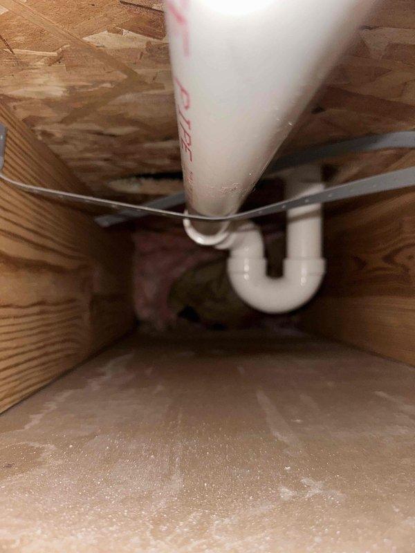 Returned to address recurring bathtub drain leak that reappeared after initial repair attempt three weeks prior. Accessed plumbing from crawl space below bathroom and inspected PVC drain assembly, P-trap, and connections for signs of failure. Identified source of leak, tightened connections, and verified proper drainage flow. System tested and confirmed watertight with no active leaks present at time of departure.