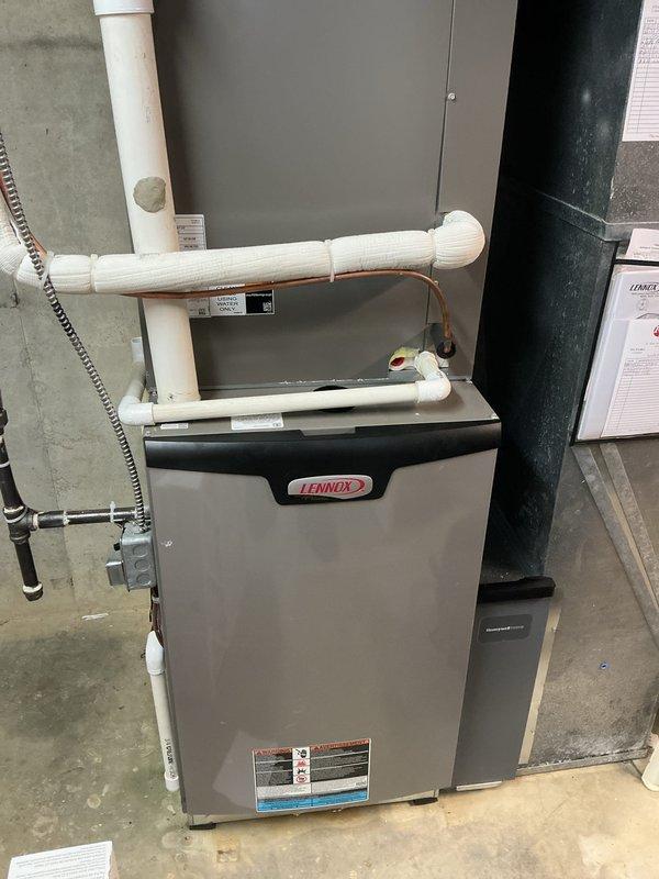 Completed cooling maintenance on Lennox HVAC system including furnace and thermostat inspection. Replaced 20x25x4 air filter, verified thermostat operation showing 70°F indoor temperature with system set to cool to 73°F and indoor humidity at 59%. Inspected furnace unit, PVC condensate drain lines, and electrical connections with all components operating within normal parameters.